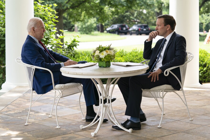 FILE - President Joe Biden meets with Sen. Chris Murphy, D-Conn., about gun control outside the Oval Office of the White House, June 7, 2022, in Washington. Murphy has been the Senate’s leading advocate for stronger gun control since the massacre of 20 children at a school in Newtown, Connecticut in 2012. “There has been a thirst from voters, especially swing voters, young voters, parents, to hear candidates talk about gun violence, and I think Democrats are finally sort of catching up with where the public has been,” said Murphy. (AP Photo/Evan Vucci, File)