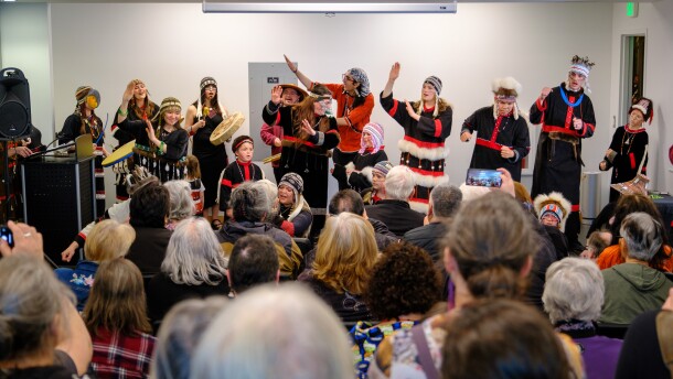 Alutiiq Dancers drew a crowd that filled the new event space, with some standing in the doorways for a glimpse of the dancers during the reopening.