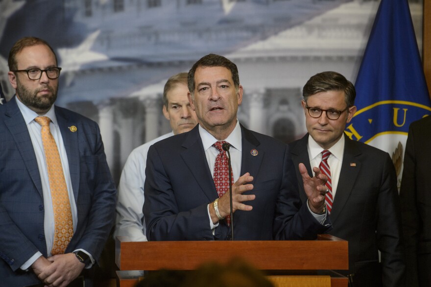 FILE - Rep. Mark Green, R-Tenn., center, is joined by from left: Rep. Jason Smith, R-Mo., Rep. Jim Jordan, R-Ohio, and Speaker of the House Mike Johnson, R-La., right, during a news conference at the Capitol, May 20, 2025, in Washington.