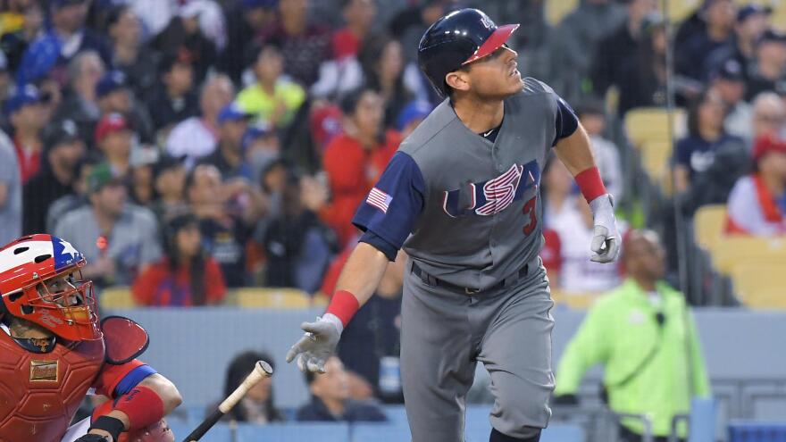 United States' Ian Kinsler watches his two-run home run against Puerto Rico on Wednesday during the third inning of the final of the World Baseball Classic in Los Angeles.