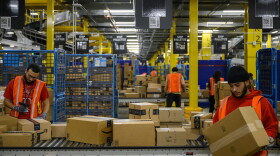 Amazon workers sort packages inside Amazon fulfillment center BDL 4 in Windsor, May 2, 2023. The fulfillment center is Windsor’s fourth and employs more than 2,000 full and part-time hourly and salaried employees.