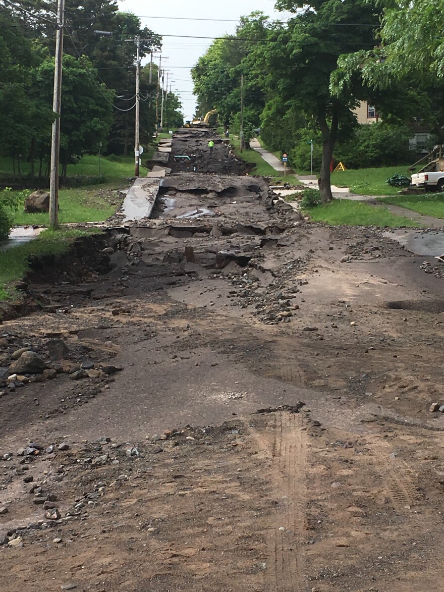 Heavy mud covers Agate Street in Houghton