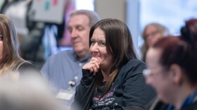 Erika Shambaugh and other audience members listen during a “Voices of the Epidemic” forum hosted by Spotlight PA in April 2025 in Berks County.