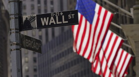 FILE - American flags fly outside the New York Stock Exchange, Friday, Sept. 23, 2022, in New York. (AP Photo/Mary Altaffer, File)