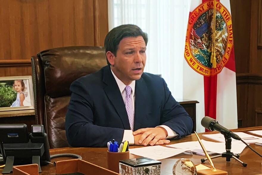 Florida Gov. Ron DeSantis updates media in response to the coronavirus on Tuesday, March, 24, 2020 in Tallahassee, Fla. 