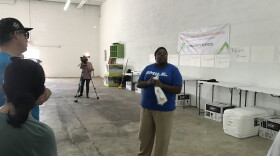 Valencia Gunder, a Miami-Dade-based community organizer, gives a tour of the warehouse near Opa-Locka that will be used as a "community emergency operations center" following a hurricane or other disaster.