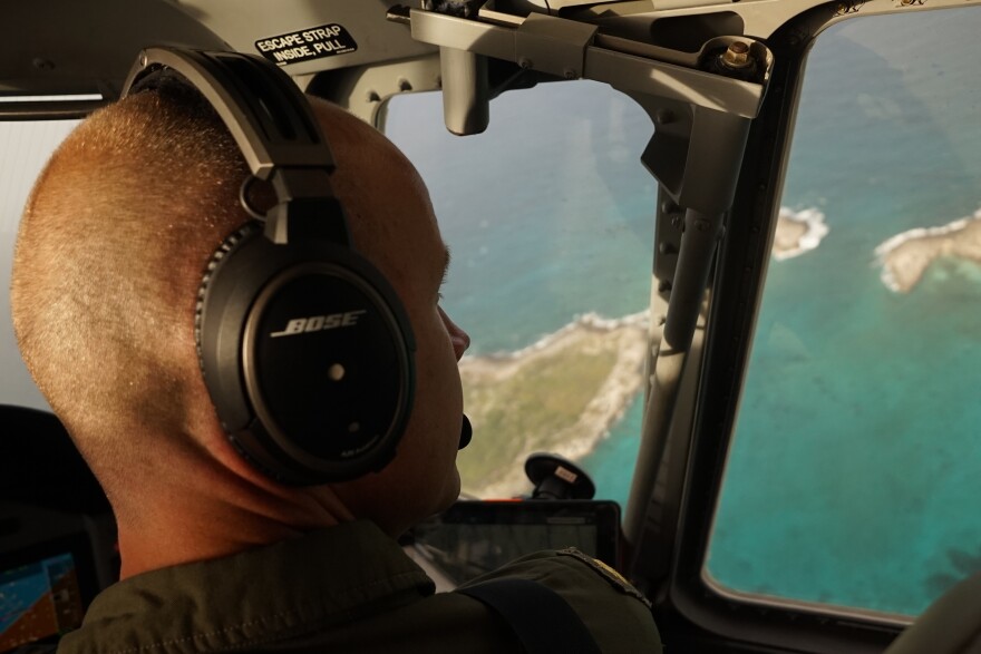 Steve Drauszewski, a lieutenant commander and a pilot for the Coast Guard in Miami, searches islands in the Bahamas for Cuban and Haitian rafters.