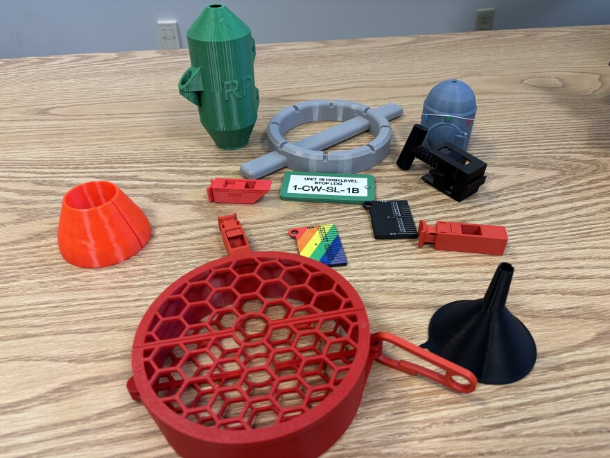 Examples of some of Dominion's 3D printed parts for the Surry nuclear plant, including a specialized wrench, handrail protection and rulers to measure battery electrolytes.