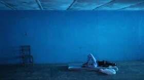 a-man-lies-in-a-newly-opened-ebola-isolation-center-in-a-closed-school-in-monrovia-liberia-on-thursday-the-official-death-toll-of-1000-people-in-four-countries-is-likely-below-the-actual-number-th