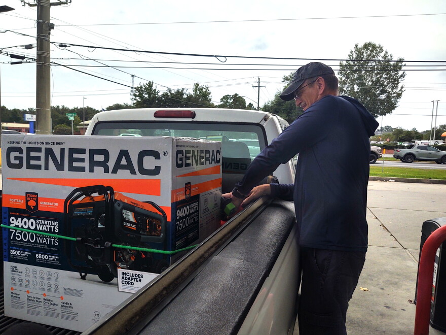Robert Rink of Pace loads up his generator.