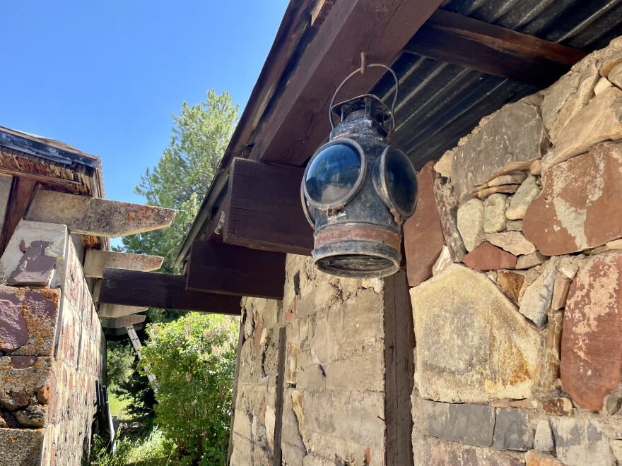A lantern hangs outside one of the stone buildings at the Soldner Center for the Arts and Innovation in Aspen. The property, once the home of artists Paul and Ginny Soldner, is now on the National Register of Historic Places; many of the building materials were gathered from nearby sources, including the field behind the property.