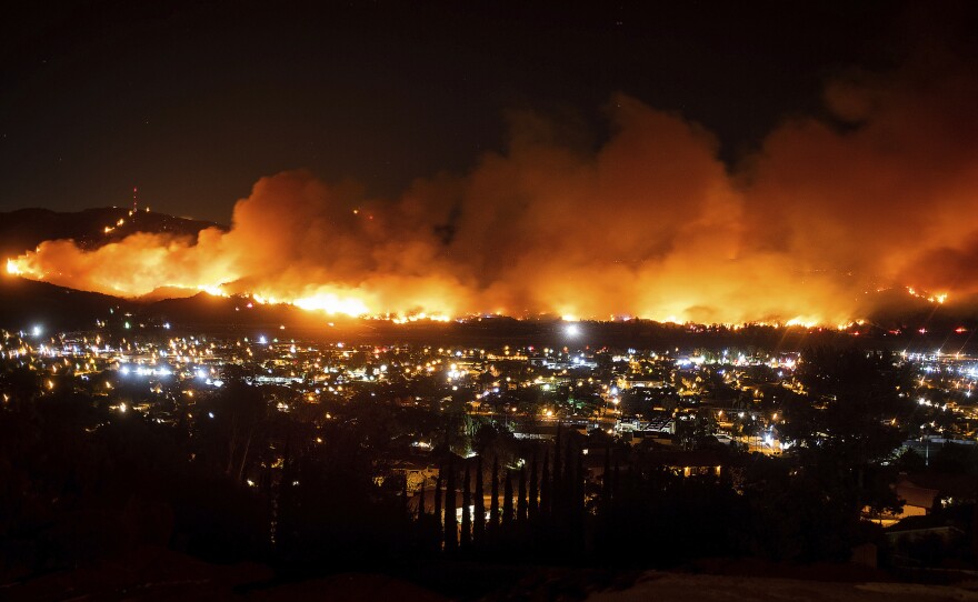 The Maria Fire is seen in Santa Paula, Calif. Ventura County law enforcement said the "firefighting aerial efforts were hampered by someone flying an unmanned aerial system."