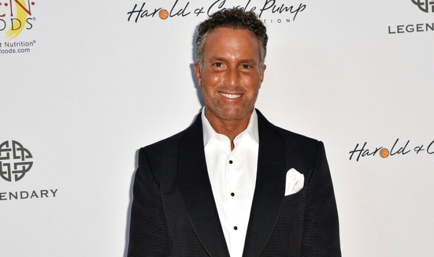 In this Aug. 7, 2015 file photo, Philip Esformes arrives at the 15th Annual Harold and Carole Pump Foundation Gala held at the Hyatt Regency Century Plaza, in Los Angeles. The Florida health care executive was sentenced to 20 years in prison and ordered to pay about $5.5 million in restitution and forfeit $38.7 million.