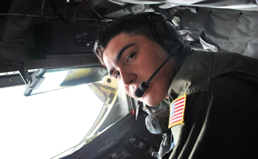 Boom operator Alberto Ayala in the boom pod of the KC-135.  He's a senior airman in the Air Force's 906th. He's one of about 100 active duty airmen who work with the 126th.