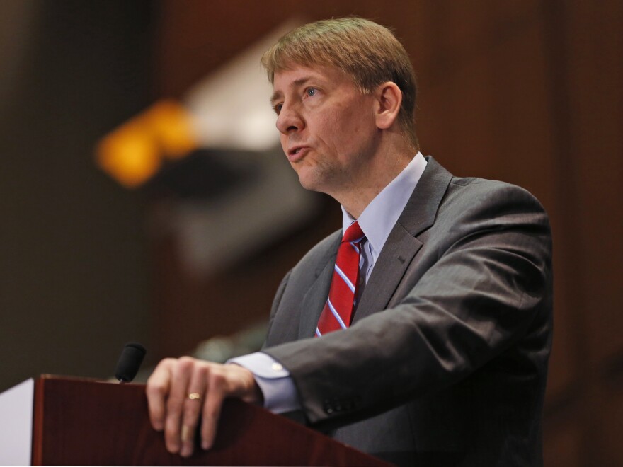 Consumer Financial Protection Bureau Director Richard Cordray speaks during a panel discussion in Richmond, Va., in 2015.