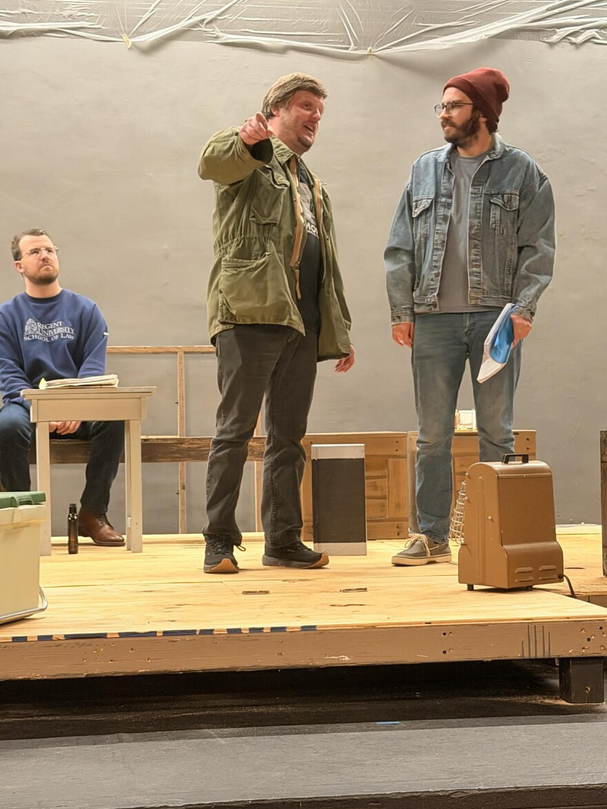 Kevin McAlexander (Shaw/Quint) makes a point to Nick Vogel (Dreyfuss/Hooper) as Bryan Stokke (Scheider/Brody) looks on during rehearsal.