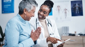 Black woman, doctor and elderly patient with good news, tablet and results for health, advice and report. Happy african medic, mobile touchscreen or healthcare with smile, tech or support in hospital.