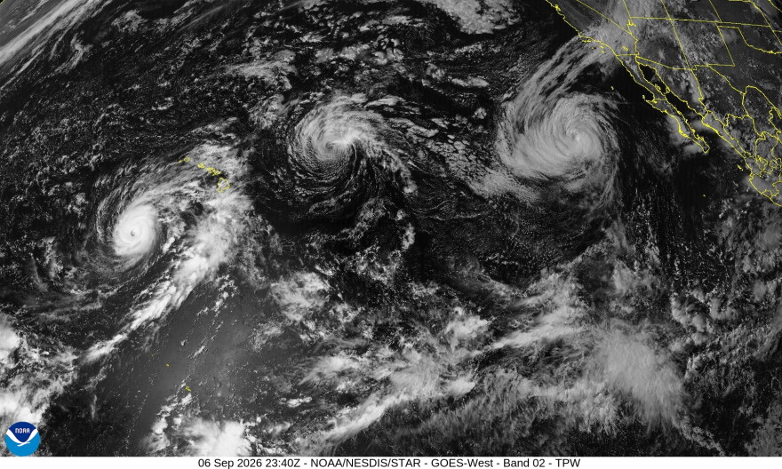 A satellite image shows from left to right, Hurricane Lowell, Tropical Storm Karina and Hurricane Marie in the Pacific on Sunday evening, Sept. 6, 2026.