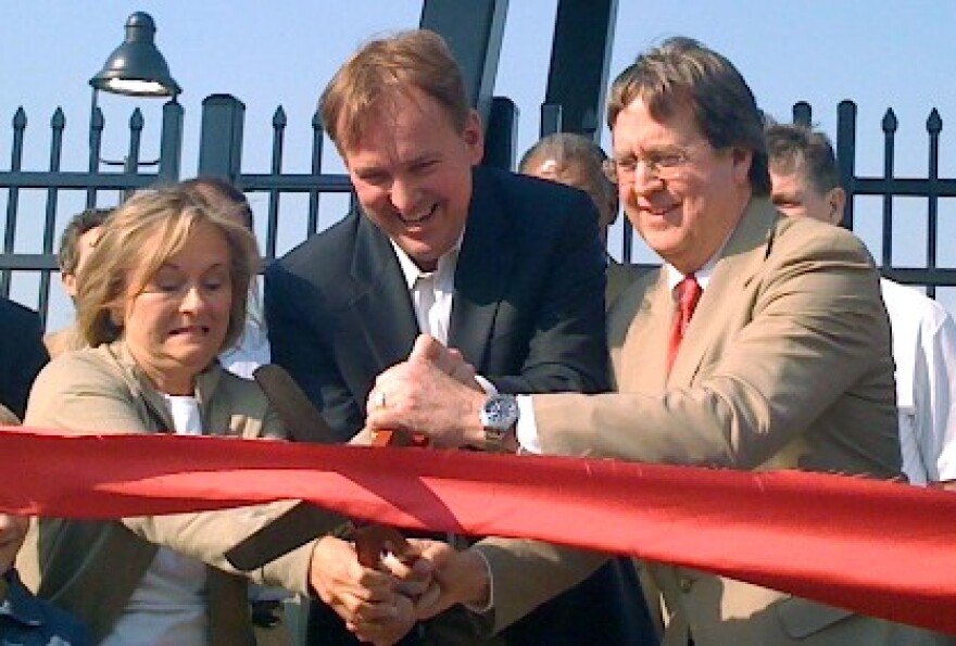 Former Mayor Taylor, Drillers Owner Chuck Lamson and Mayor Bartlett cut the ribbon on Tulsa's new ONEOK Field.