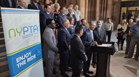 Miguel Velázquez, the president of the New York Public Transit Association, speaks at the State Capitol on Wednesday, March 25, 2026.