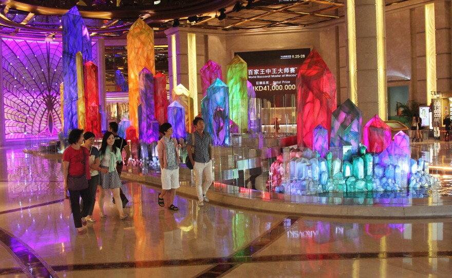 Visitors stroll through the lobby of the Galaxy Macau casino on the Cotai Strip, land that was created when two of the territory's islands were joined.