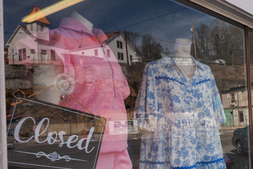 The window of a store on Pound’s Main Street reflects a section of the Town of Pound. Grants from TNC’s Cumberland Forest Community Fund are geared to lift up struggling localities. Solar developers will be contributing to that fund.