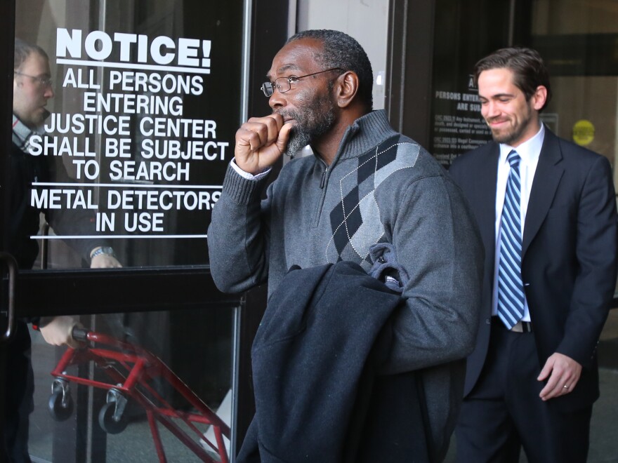 Ricky Jackson is overcome with emotion as he leaves the courthouse.