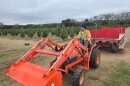Douglas Hingst operates a tractor at the Pipe Creek Christmas Tree Farm on Dec. 4, 2025