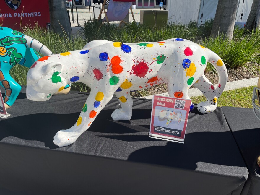 A Florida Panthers statue painted by tennis star Martina Navratilova is displayed for auction in Miami on Friday, Jan. 2, 2025, in an effort to raise money to fight cancer. (AP Photo/Tim Reynolds)