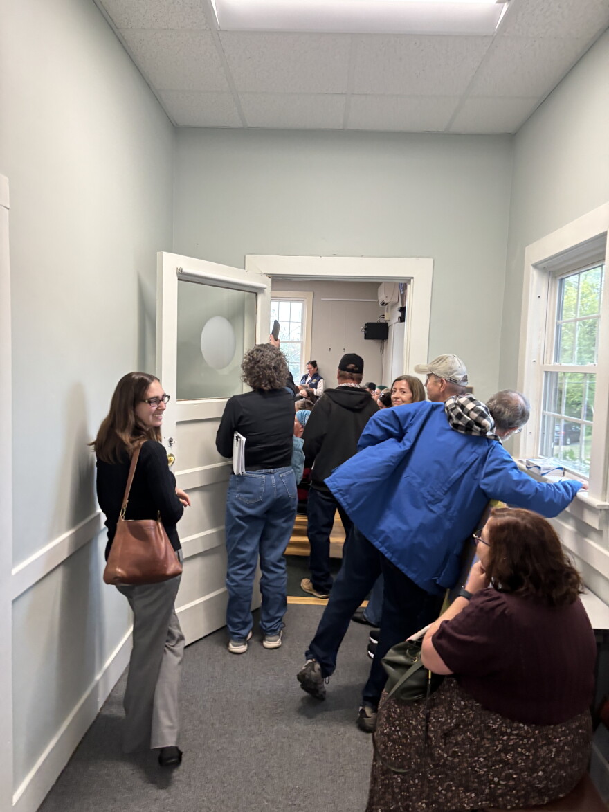 People spilled out of a select board public comment session on a potential data center in Bow, New Hampshire.