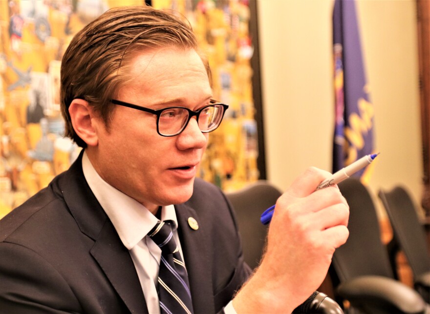 Kansas Lt. Gov. and Commerce Secretary David Toland gestures during an interview with the Kansas News Service.