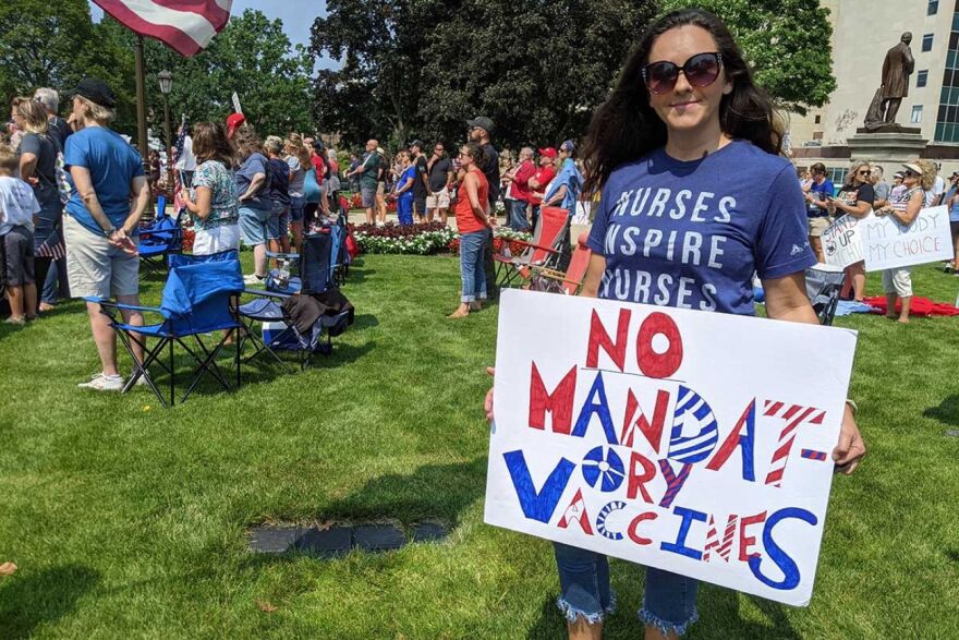 Ascension nurse Cristina Buia said her faith guided her decision against a flu vaccine and now a COVID-19 shot. In August, she protested vaccine mandates in Lansing.