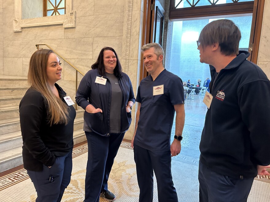 Nurses gathered at Ohio Statehouse talk before event on Nurses Day 2023 at the Ohio Statehouse