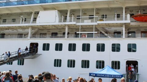Passengers disembark from a cruise ship in downtown Ketchikan in June 2024. 