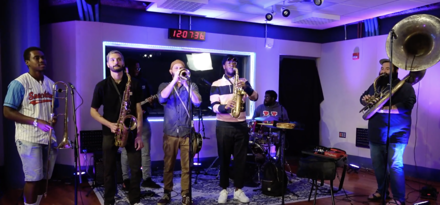 SNACKTIME is (L to R) Michael Spearman, trombone; Ben Stocker, tenor saxophone; Larry Monroe Jr., guitar; Eric Sherman, trumpet; Yesseh Furaha-Ali, alto saxophone; Austin Marlow, drums; and Sam Gellerstein, sousaphone