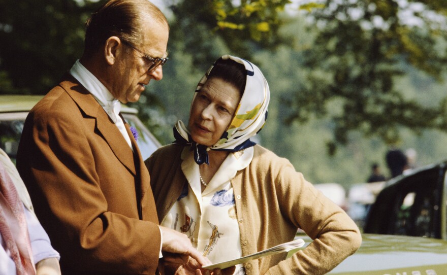 Philip and Elizabeth chat during the Royal Windsor Horse Show in 1982.