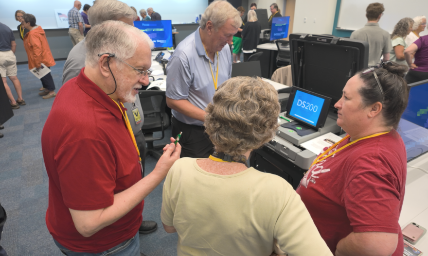 Election judges in training get comfortable with Greene County's election equipment during a training in July 2026.