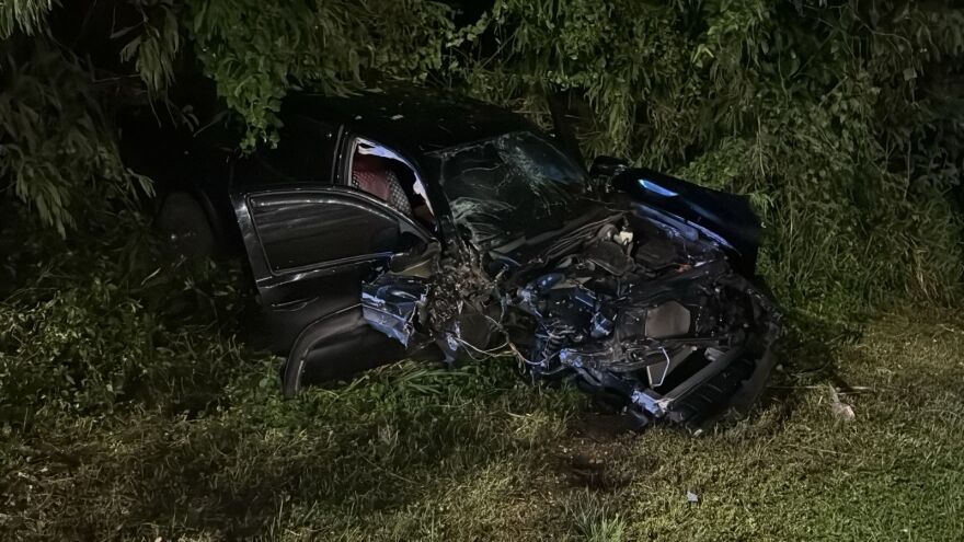 The black Toyota Tacoma pick-up truck driven by Richmond Ray Saimon after the crash.