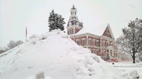 Snow is piled on the courthouse square in Macomb after the snowstorm earlier this week. More snow, possibly freezing rain, and much colder temperatures are on the way.