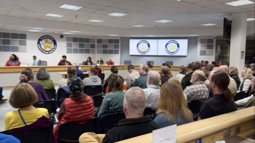 Voters listens to candidates at a forum hosted by the Tanana Valley League of Women Voters in the Fairbanks North Star Borough Assembly Chambers on Friday, September 13, 2024.