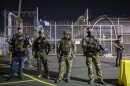 FILE — Federal agents on guard outside an ICE detention facility in Newark, N.J., June 12, 2025. The Trump administration authorized the deployment of National Guard units at immigration facilities, escalating its use of the military as part of President Trump’s immigration crackdown.