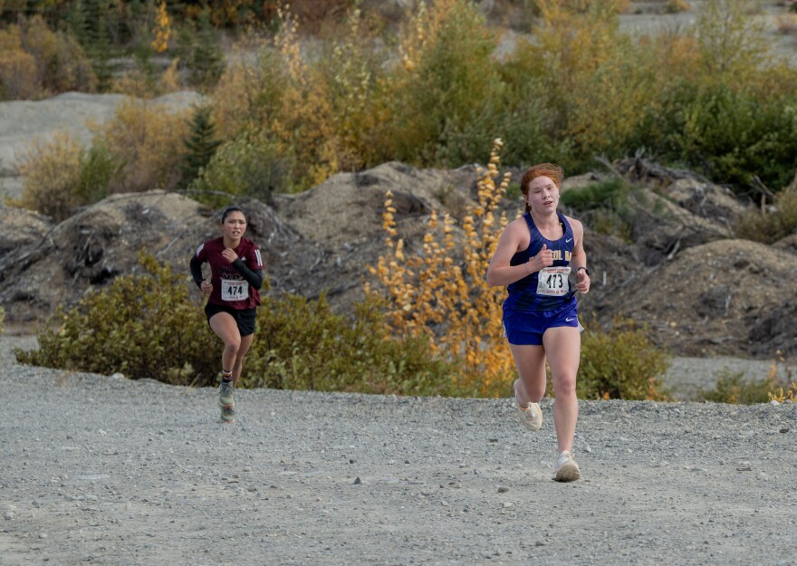 First place finisher Bristol Bay Senior Brooke Phelps leading the race with second place finisher Shae Nelson from Igiugig close behind.