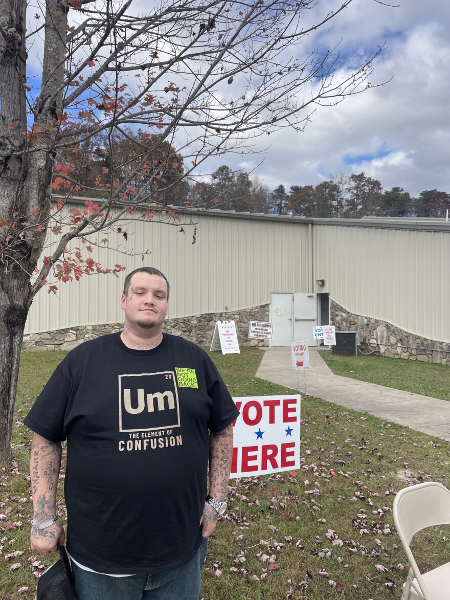 Justin Ron Huskey was hired by the Swain County Democrats to pass out sample ballots at the Birdtown Community Building. He's an enrolled member of the Eastern Band of Cherokee.