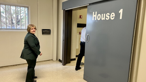 Barnstable County Sheriff Donna Buckley prepares to enter House 1, one of the groups of cell blocks at the county jail.