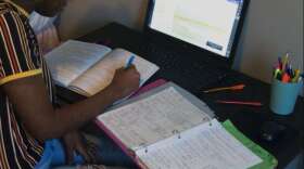 WLRNJasmin McIver attends class and studies remotely from her bedroom in Margate, Fla. Photo: Jasmin McIver / WLRN