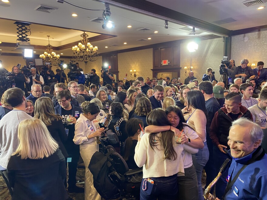 Supporters of Maggie Hassan and Chris Pappas celebrate at the Puritan on Election Night