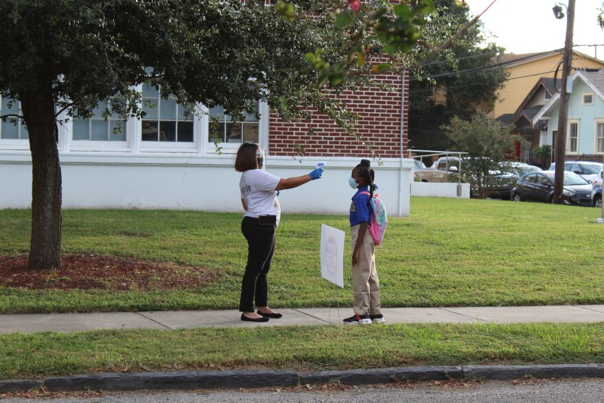 A student arrives at McDonogh 42 on the first day of in-person classes, Sept. 17, 2020.