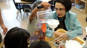 Nancy Golden watches two Earl Boyles Elementary School preschoolers.