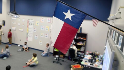 A Texas flag is displayed in an elementary school in Murphy, Texas, Thursday, Dec. 3, 2020. 