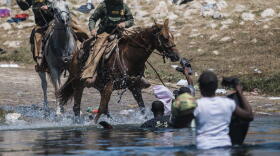  TRUMP-FEELING MOMENT Horse-mounted U.S. Border Patrol agents drive back asylum-seeking Haitian migrants on the bank of the Rio Grande at Del Rio, Texas, last weekend.